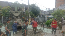 Kolaborasi TNI-Polri dan Warga, Progres Jalan TMMD Depok Tembus 67 Persen