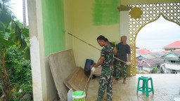 Satgas TMMD Ke-129 Bersama Warga Laksanakan Pengecatan Masjid di Desa Polewali