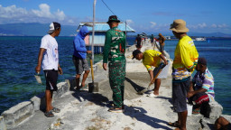 Dipimpin Pasiter, Satgas TMMD dan Masyarakat Gotong Royong Cor Dermaga Umbele