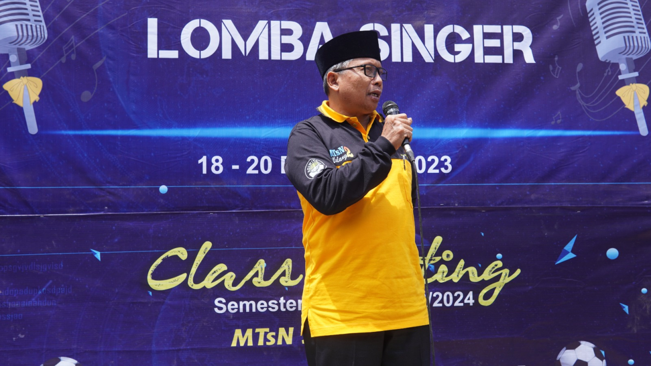 Caption. Kepala MTsN 2 Malang, H Sam'ai, MAg saat memberikan sambutan