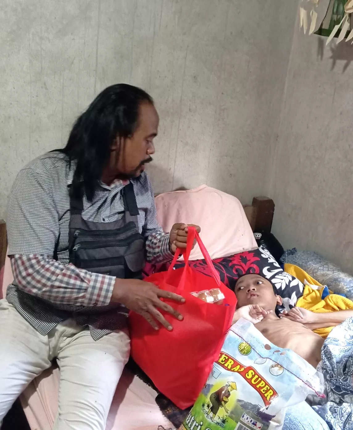 Kisah Ibu Sriyani, 16 Tahun Setia Merawat Kadek Budiana yang Lahir Prematur