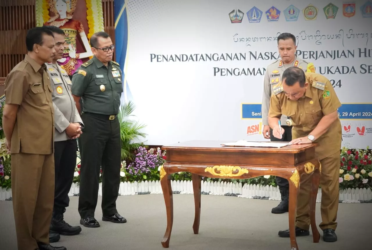 Bupati Tamba Tandatangani NPHD Pengamanan Pilkada 2024