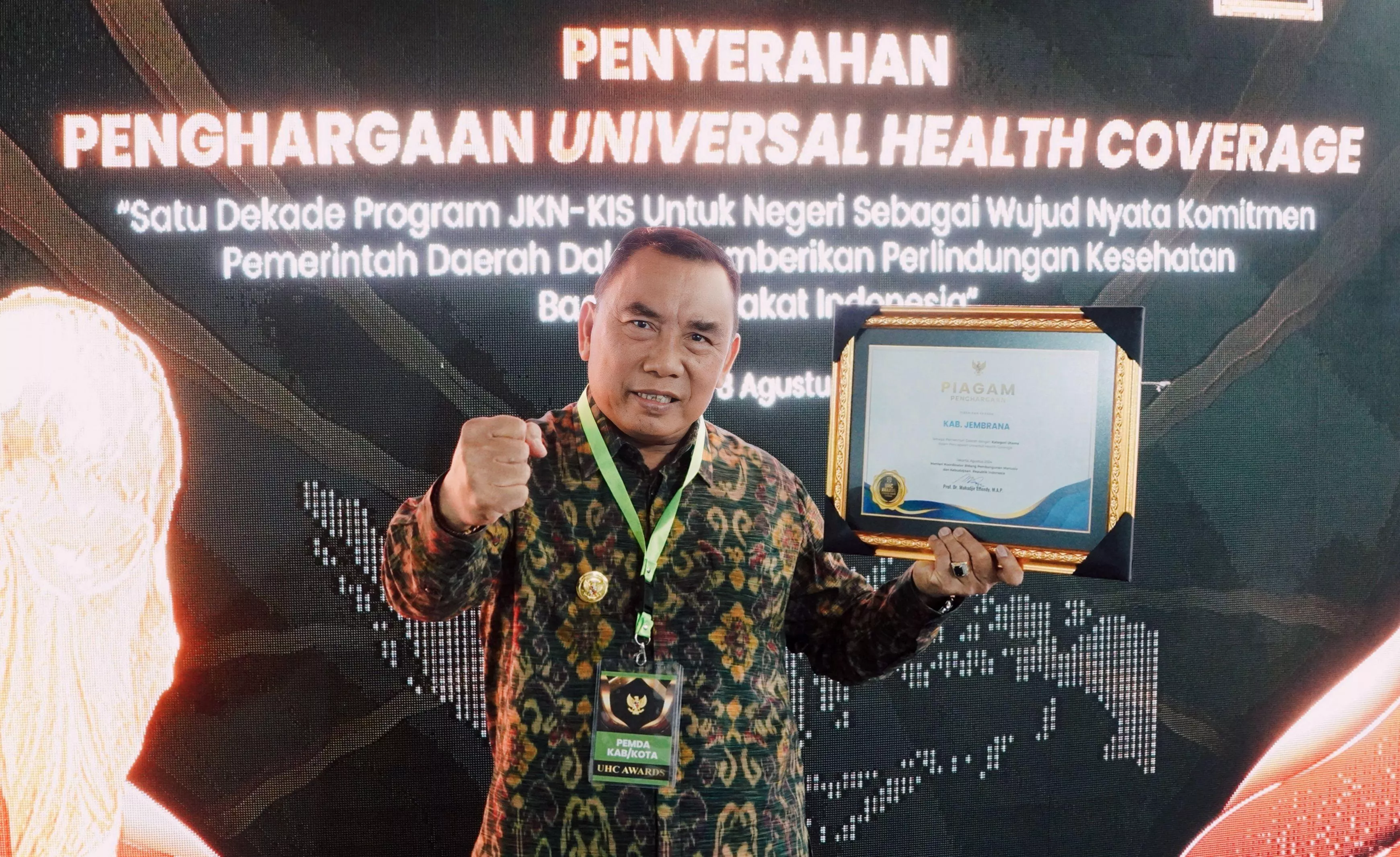 Kado Manis Hut Kota Negara ke- 129, Jembrana Raih Penghargaan UHC Kategori Utama