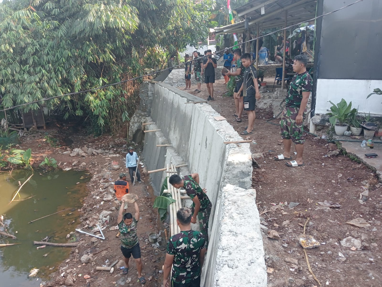 Satgas TMMD ke 121 Kota Depok Terus Kebut Turap Jalan Delima Bojongsari Baru